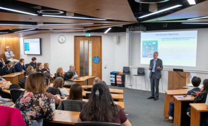 Man presenting at UCL's Entrepreneurship Community of Practice Event