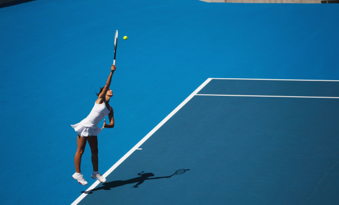 A woman serving in tennis