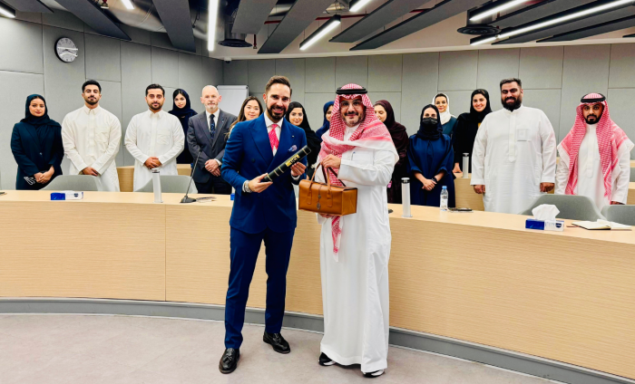 Paolo delivering a scroll in Saudi Arabia 